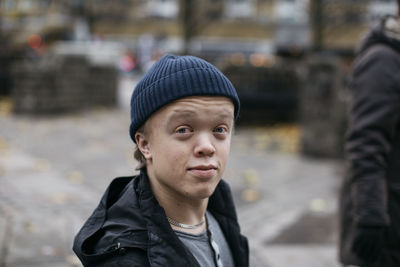 Portrait of teenage boy wearing wooly hat