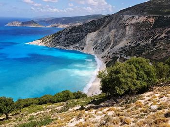 Aerial view of sea against mountain