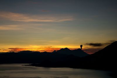 Silhouette of mountain at sunset