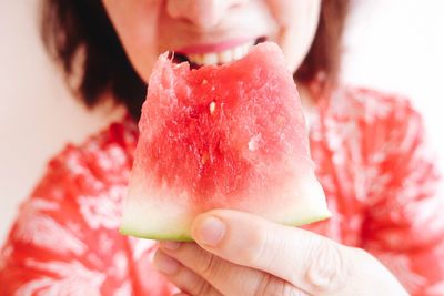 Close-up of woman eating ice cream