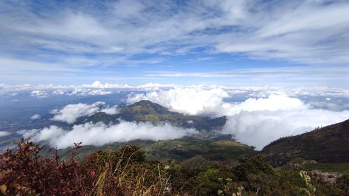 Scenic view of clouds over mountain