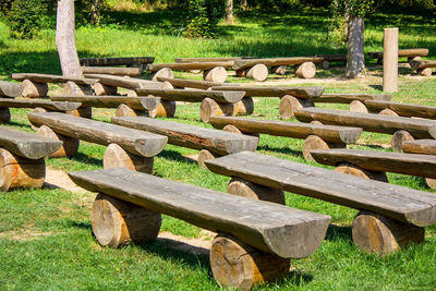 Wooden bench in field