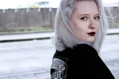 Portrait of young woman with dyed hair 