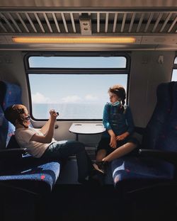 People sitting in train