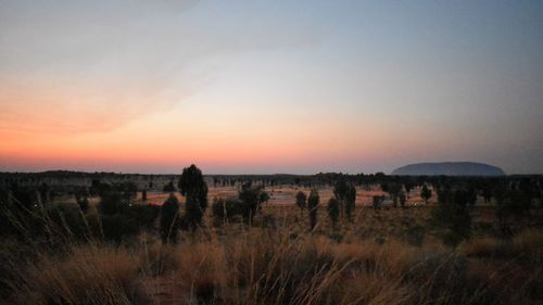 Scenic view of landscape against sky during sunset