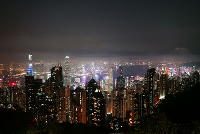 Illuminated buildings in city at night