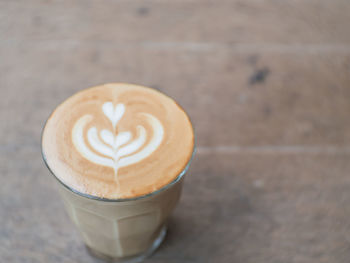 High angle view of cappuccino on table