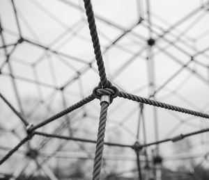 Close-up of metal against sky