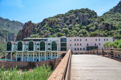 Panoramic shot of building and trees against sky