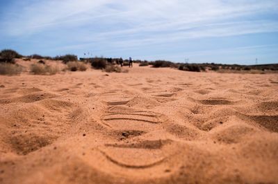 Sandy beach against sky