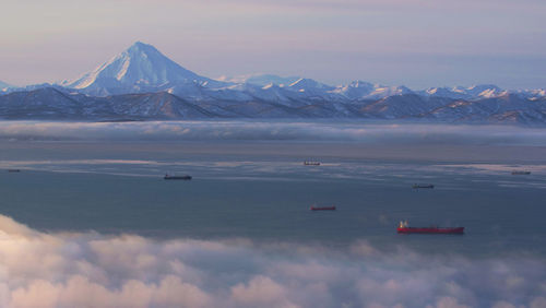 Scenic view of snowcapped mountains against sky