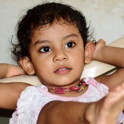 Portrait of cute baby at home