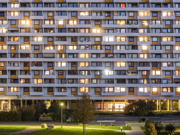 Germany, baden-wurttemberg, stuttgart, balconies of apartment building in hallschlag district at dusk