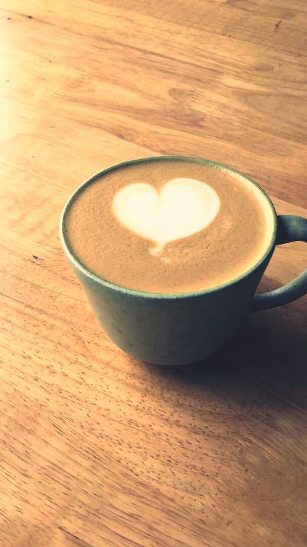 CLOSE-UP OF COFFEE ON TABLE