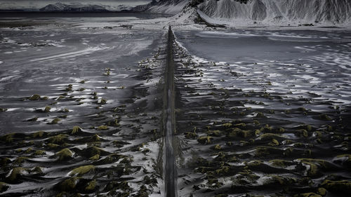 Scenic view of snow covered land