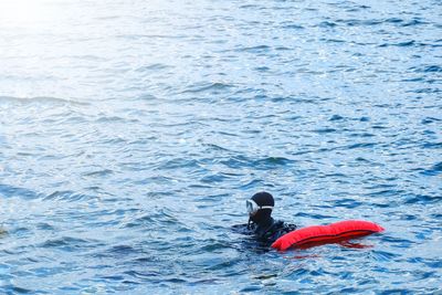 High angle view of person swimming in sea