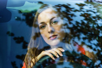 Portrait of young woman looking away