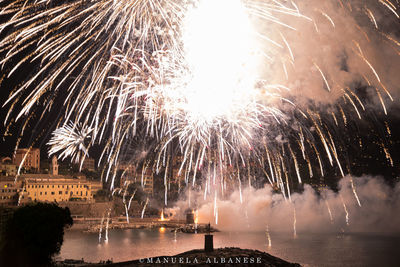 Firework display at night
