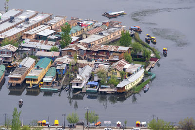 High angle view of sailboats moored in lake