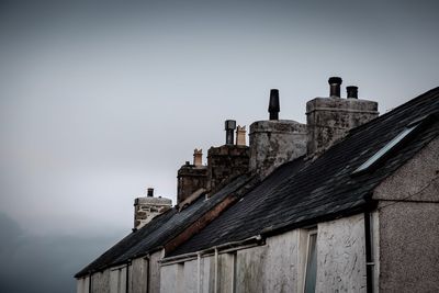 Low angle view of old building against sky