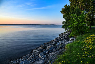 Scenic view of sea against sky during sunset