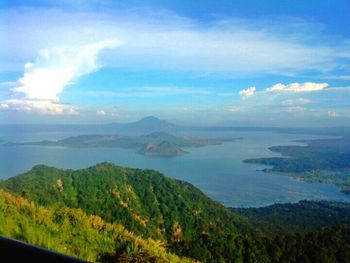 Scenic view of landscape against cloudy sky