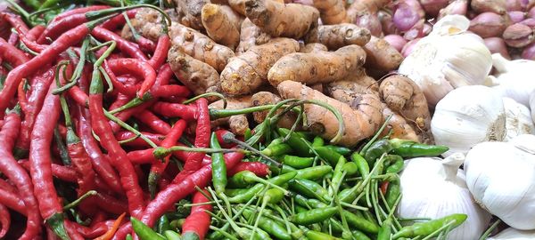 Red chili peppers for sale at market stall