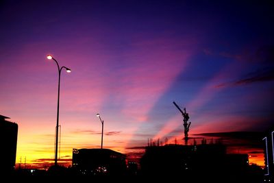 Silhouette of building at sunset