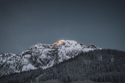 Snow covered mountain against sky