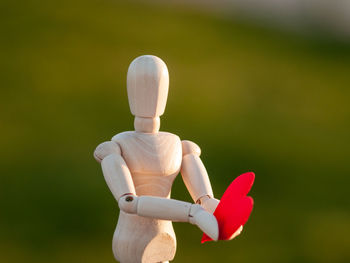 Close-up of stuffed toy on field