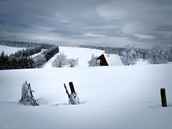 Lonely cabin in the mountains during winter