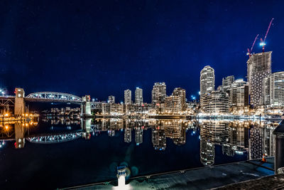 Illuminated buildings in city at night