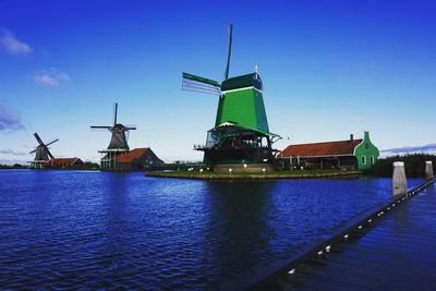 Traditional windmill against blue sky