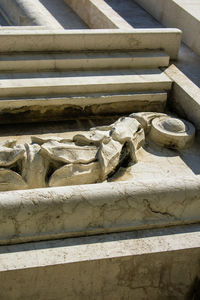 Stone sculpture in front of building