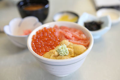 Close-up of fruits in bowl on table