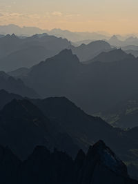 Scenic view of mountains against sky during sunset