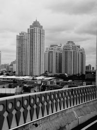 Modern buildings against sky in city