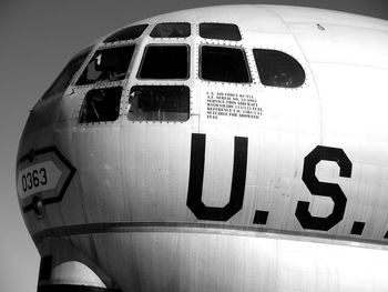 Close-up of airplane on airport runway