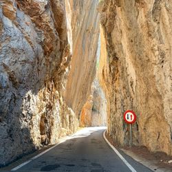 Road passing through rock formation