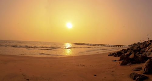 Scenic view of sea at sunset