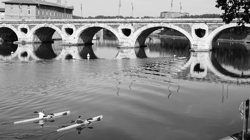 Arch bridge over river