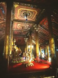 Interior of illuminated building at night