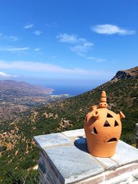 View of pumpkin on shore against sky