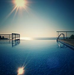 Scenic view of swimming pool against clear sky