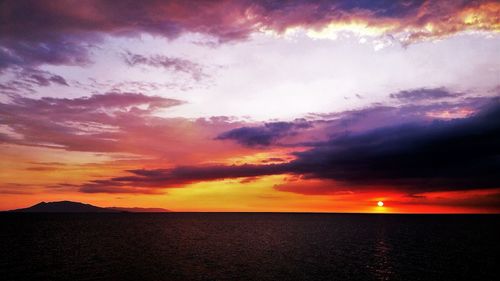 Scenic view of dramatic sky over sea