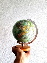 Close-up of man holding glass