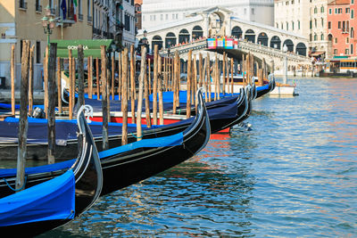 View of gondola anchored on canal