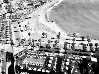 High angle view of buildings by sea