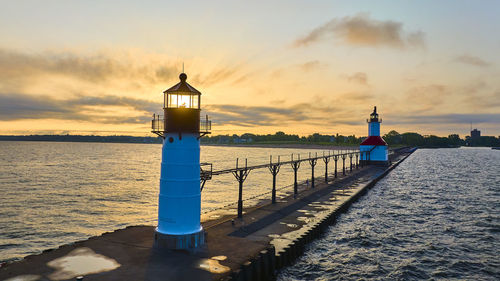 Pier over sea against sky