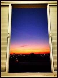 Built structure against clear sky at sunset